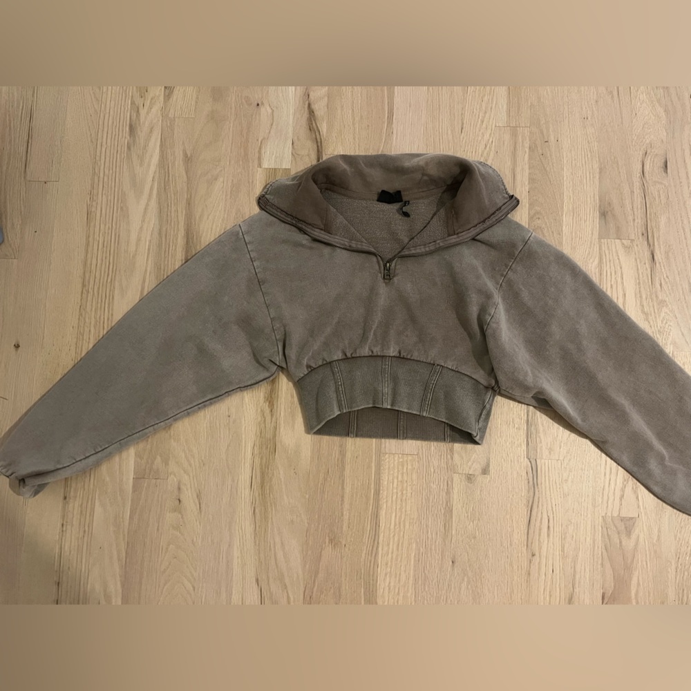 Urban Outfitters out from under cropped sweatshirt!
